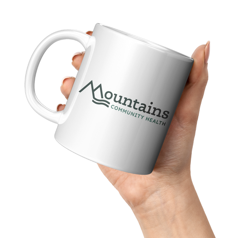 Mountains_Community_Health_-_Coffee_Mug_11oz_White_LH_Model_Mockup.png_16036752