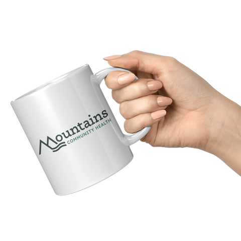 Mountains_Community_Health_-_Coffee_Mug_11oz_White_RH_Model_Mockup.png_16036754